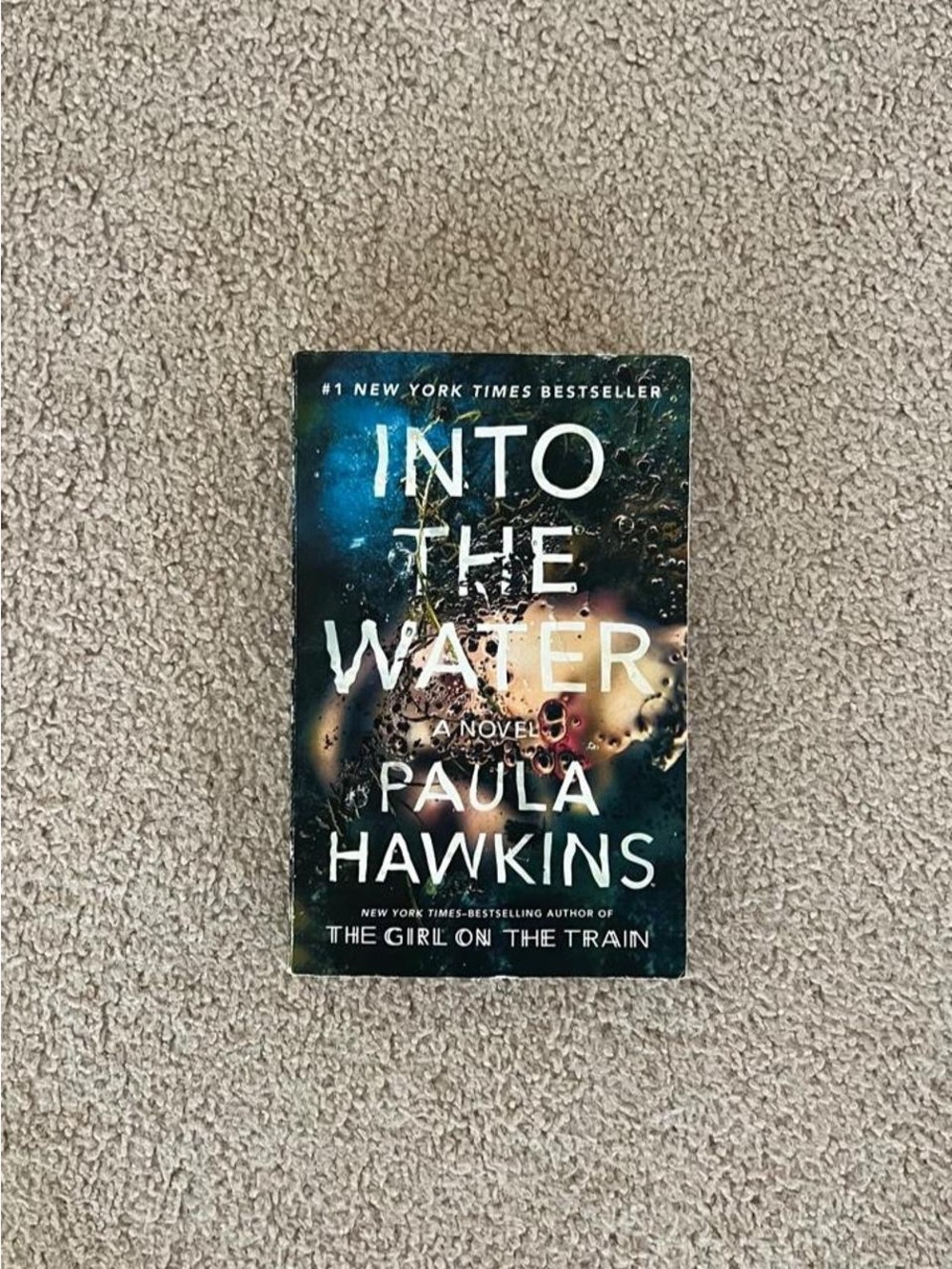 Into the Water by Paula Hawkins paperback book